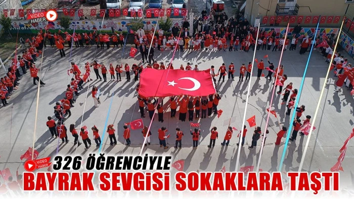 Karab&uuml;k'te ilkokul &ouml;ğrencilerinden "Bayrağa Saygı" y&uuml;r&uuml;y&uuml;ş&uuml;